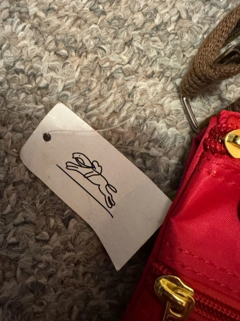 Longchamp Red Crossbody Bag with Brown Strap and Gold Accents